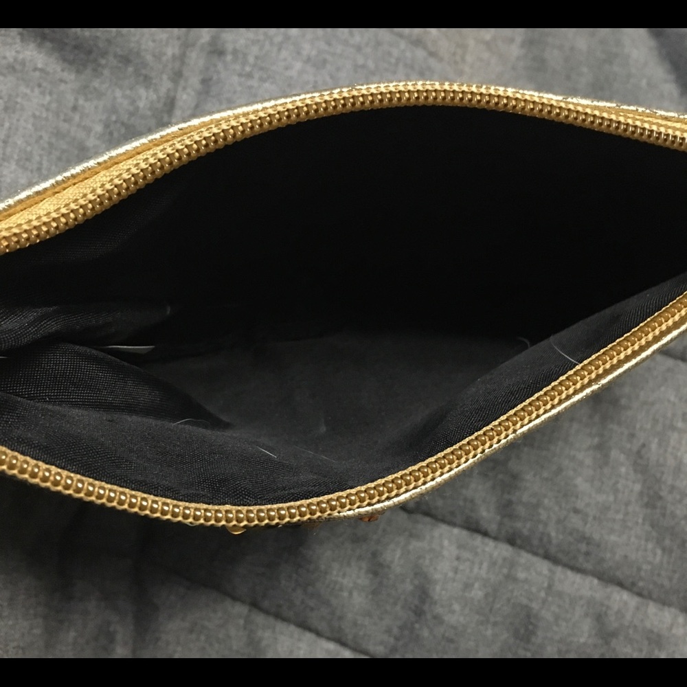 Clutch with strap